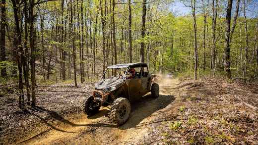 A 2024 Polaris RZR XP 1000 in the forest