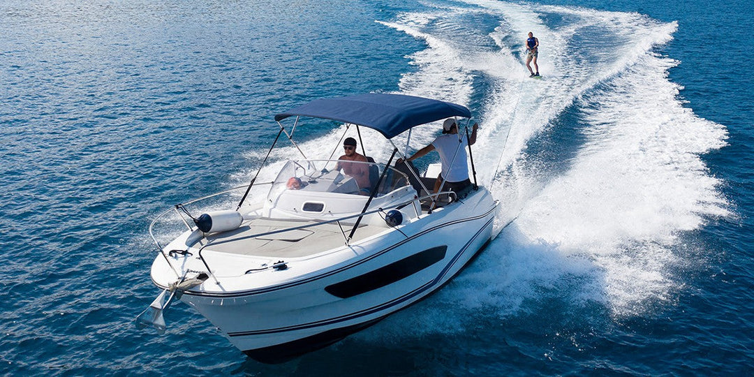 A surfing boat with KEMIMOTO 4-Bow Bimini Tops