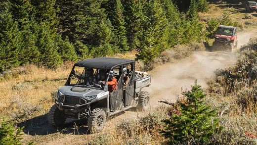 Ranger XD 1500 UTVs on a dusty road