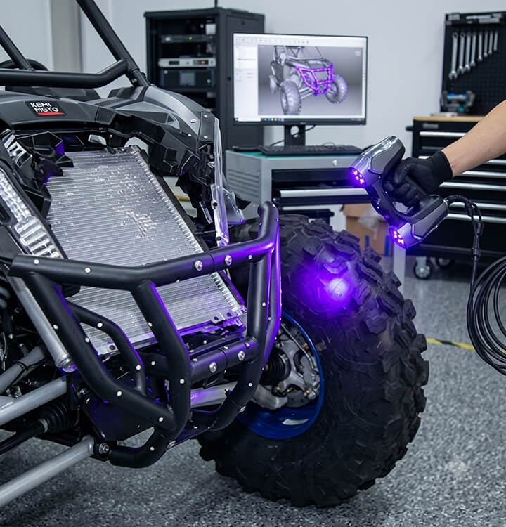 Using a handheld 3D laser scanner on a sport UTV for precise digital modeling and innovative off-road gear development.