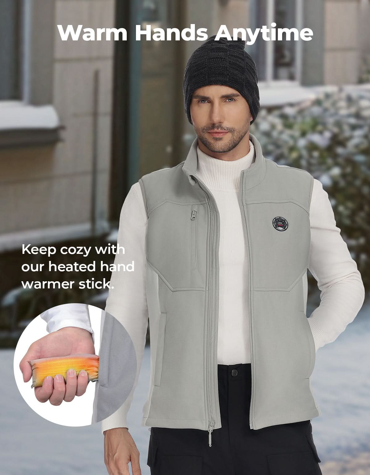 Man wearing a gray heated vest with heated hand warmer stick
